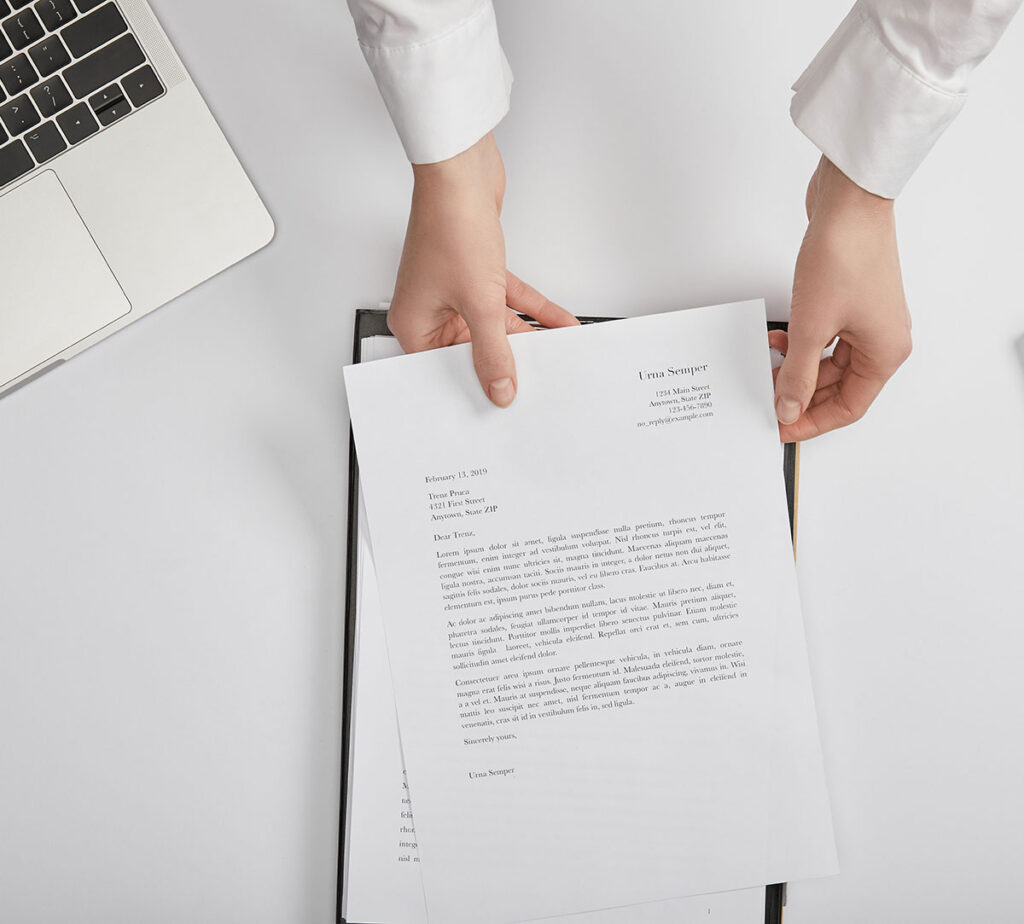 Woman holding cover letter ready to apply for a job